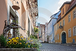 Colorful street with flowers in Rothenburg ob der Tauber in Germany