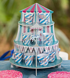 Colorful striped blue and pink birthday carousel