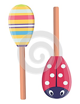 Colorful striped maracas next to a red ladybug themed maraca. Musical instruments, percussion, cartoon style vector