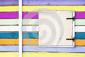 Colorful striped wall of beach house.