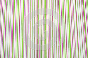 Colorful striped wrapping paper for gifts. bright texture of vertical stripes closeup