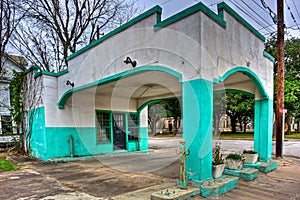 Colorful Stucco Covered Abandoned Gas Station