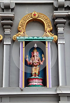 Colorful stucco Ganesha on camber altar at the temple of Hinduism and Brahmanism. The Lord of success.