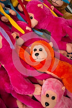 Colorful stuffed monkeys.
