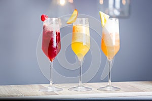 Colorful Summer Cocktails with Prosecco, Three Kind of Fruit Cocktails - Raspberry, Peach and Pineapple, Horizontal Wallpaper