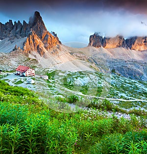 Colorful summer evening in Italy Alps, Tre Cime Di Lavaredo, Dolomites, Europe.