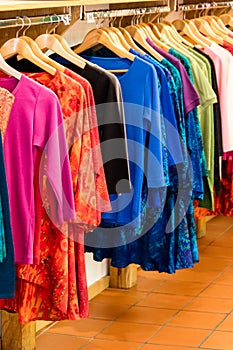 Colorful summer garments in a clothing store