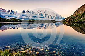 Colorful summer scene of Lac Blanc lake with Mont Blanc Monte Bianco on background, Chamonix location. Beautiful evening view of photo