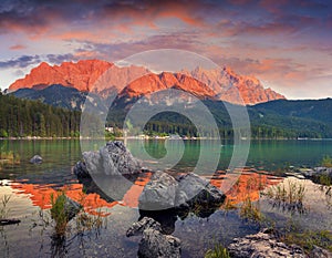 Colorful summer sunset on the Eibsee lake