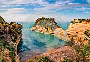 Colorful summer view of famous Channel Of Love Canal d`Amour beach. Sunny morning seascape of Ionian Sea. Amazing outdoor scene