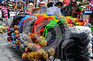 Colorful Sunday market in Otavalo, Ecuador photo