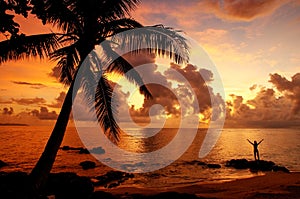 Colorful sunrise on the beach in Lavena village in Taveuni Isla