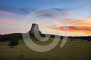 Colorful sunrise at Devils Tower in Wyoming