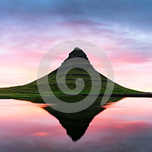 Colorful sunrise on Kirkjufellsfoss waterfall