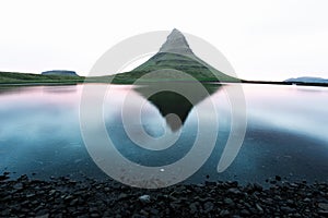 Colorful sunrise on Kirkjufellsfoss waterfall