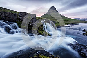 Colorful sunrise on Kirkjufellsfoss waterfall