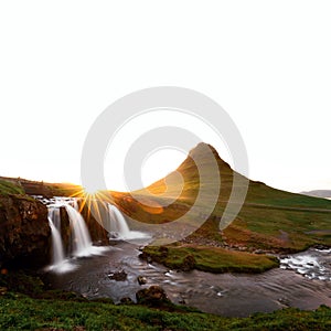 Colorful sunrise on Kirkjufellsfoss waterfall