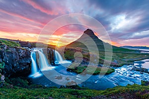 Colorful sunrise on Kirkjufellsfoss waterfall