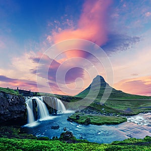 Colorful sunrise on Kirkjufellsfoss waterfall