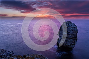 Colorful sunrise at Lonely stone Tyulenovo village, Bulgaria