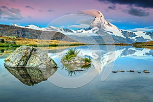 Colorful sunrise with Matterhorn peak and Stellisee lake, Valais, Switzerland