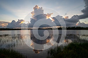 Colorful sunrise over pond in Everglades National Park.