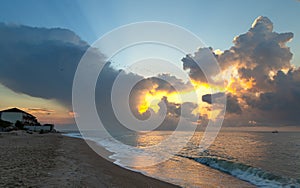 Colorful sunrise on the sea coast. Beautiful clouds