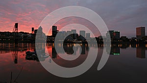 Colorful Sunset along Willamette River with Cityscape and Hawthorne Bridge in Portland Oregon Time Lapse 1080p