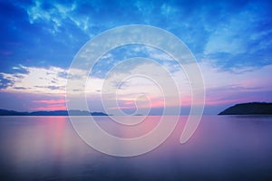 The colorful sunset cloud at the evening beach.