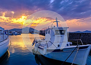 Colorful sunset in fishermen village and harbour.