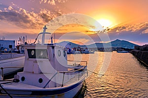 Colorful sunset in fishing village and harbour, beautiful landscape.