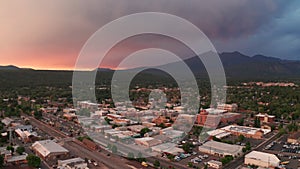 Colorful sunset Flagstaff Arizona city center downtown aerial footage