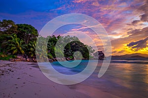 Colorful sunset over Anse Severe Beach at the La Digue Island, Seychelles