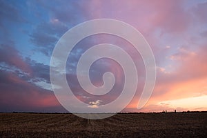 Colorful sunset over the fields