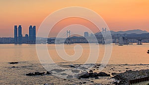 Colorful sunset over Gwangandaegyo (Diamond Bridge), a suspension bridge, Busan city, Korea