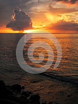 Colorful sunset over Somosomo Strait on Taveuni Island, Fiji