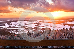 A colorful sunset in the Polish mountains of the Sudetes, the view from the top of the mountain from the Czerniec tower