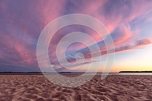 Colorful sunset on the sandy beach in Yyteri