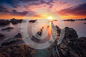 Sunset at Souris Chaude beach in Trois Bassins, Reunion Island photo