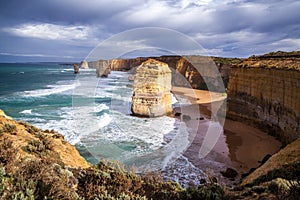 Colorful sunset views of a deserted beach and rock formations Twelve Apostles Sea Rocks near Great Ocean Road, Port Campbell