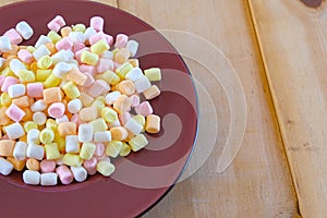 Colorful sweet candy in dise photo