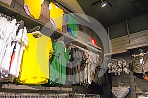 Colorful t-shirts in a luxury store