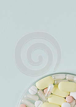 Colorful tablets in a bowl flatlay