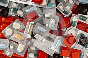 Colorful tablets and capsules in blister pack