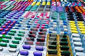 Colorful of tablets and capsules pill in blister packaging arranged with beautiful pattern. Pharmaceutical industry concept. Pharm