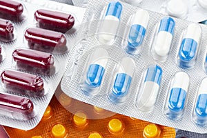 Colorful of tablets and capsules pill in blister packaging. Pharmaceutical industry concept