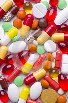 Colorful tablets and pills background
