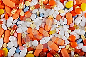Colorful tablets, pills and drugs background.