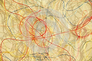 Colorful tangled threads on white surface. Abstract background