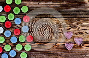 Colorful Tealight Candles on Wooden Background